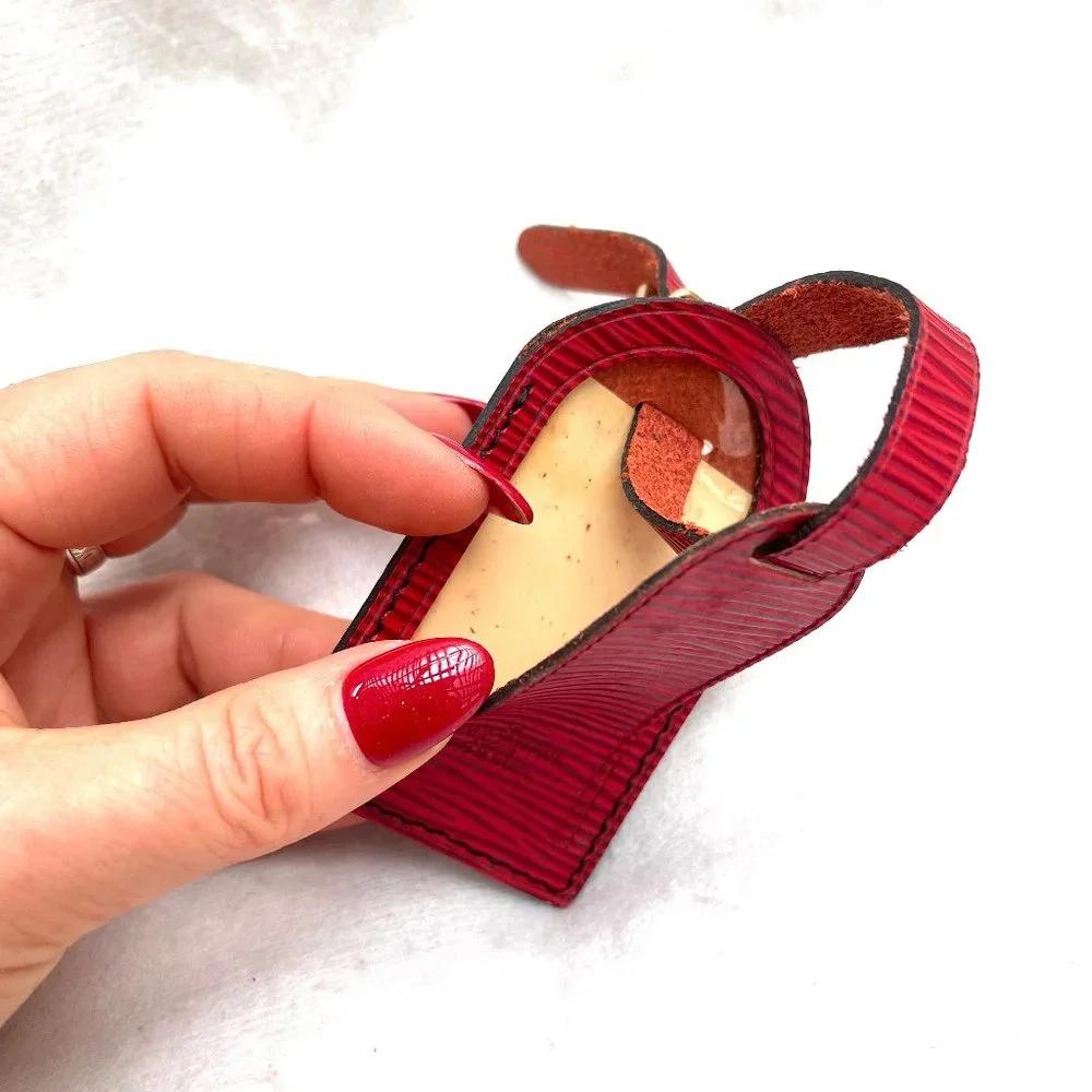 Rare Louis Vuitton red Epi leather luggage tag and poignet set